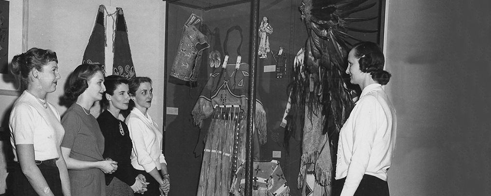 Junior League Volunteer Docents viewing a portion of the Native American collection ca. 1957